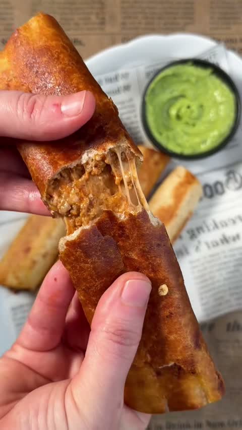 Crispy Cheesy Beef Taquitos with Creamy Avocado Sauce